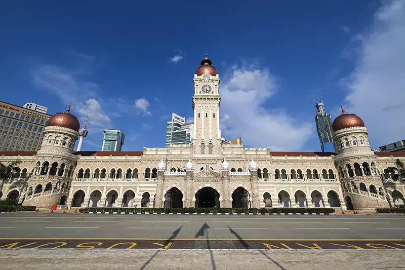 Front view of the Sultan Abdul Samad Building at Merdeka Square in Kuala Lumpur on a sunny day