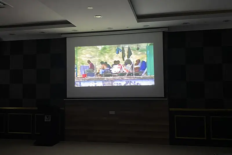 A video presentation at Malaysia Elephant Sanctuary showcasing the elephant translocation process to educate visitors on conservation efforts.